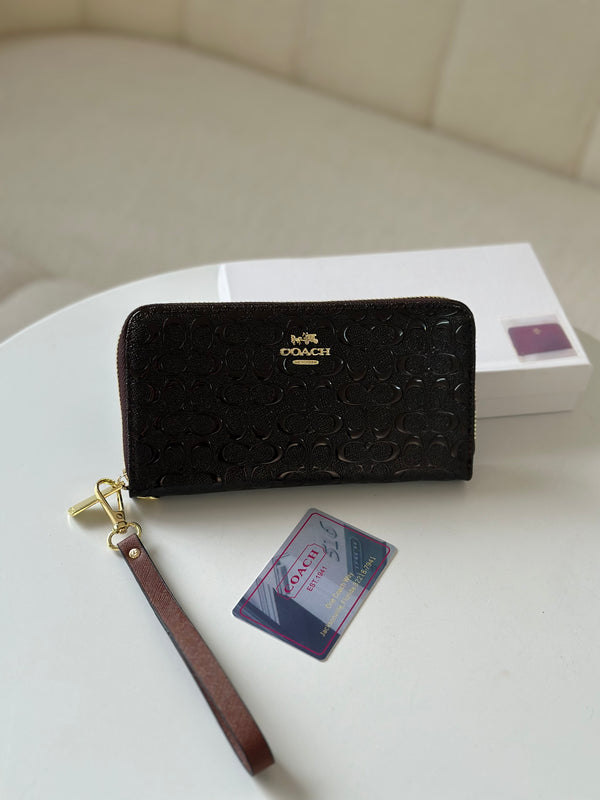 محفظة كوتش لامعه كبيرة بني🤎